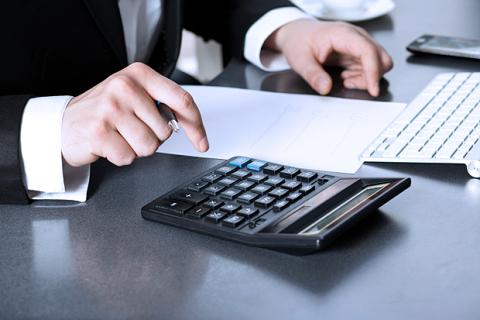 Businessman in office at the computer