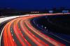 rush hour traffic at night on multiple lane highway