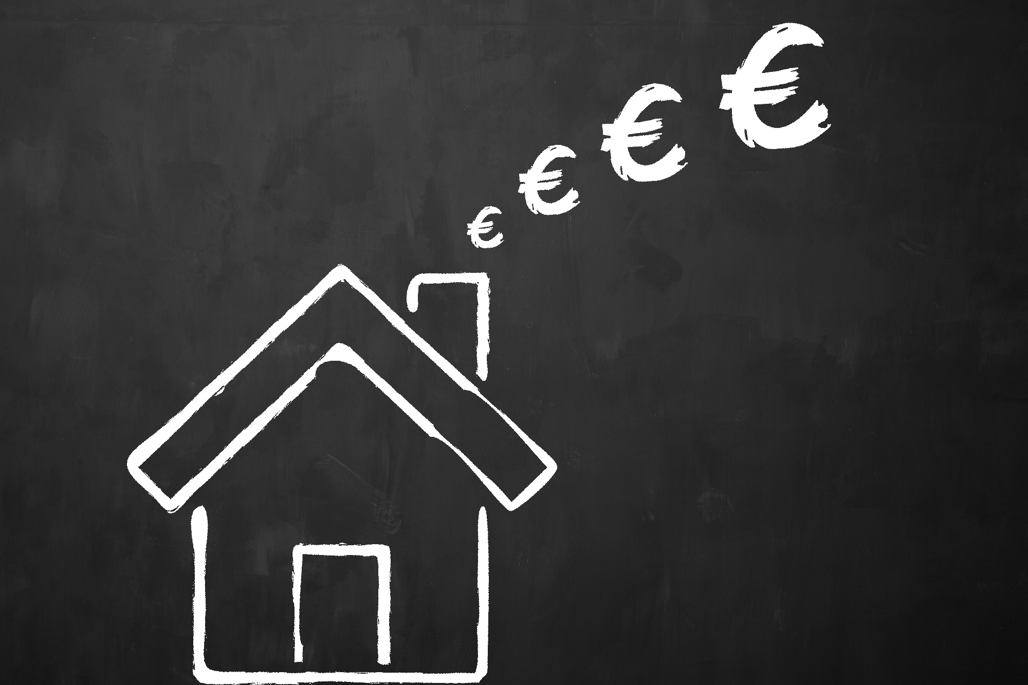 A drawing on a chalkboard of a house with euros signs