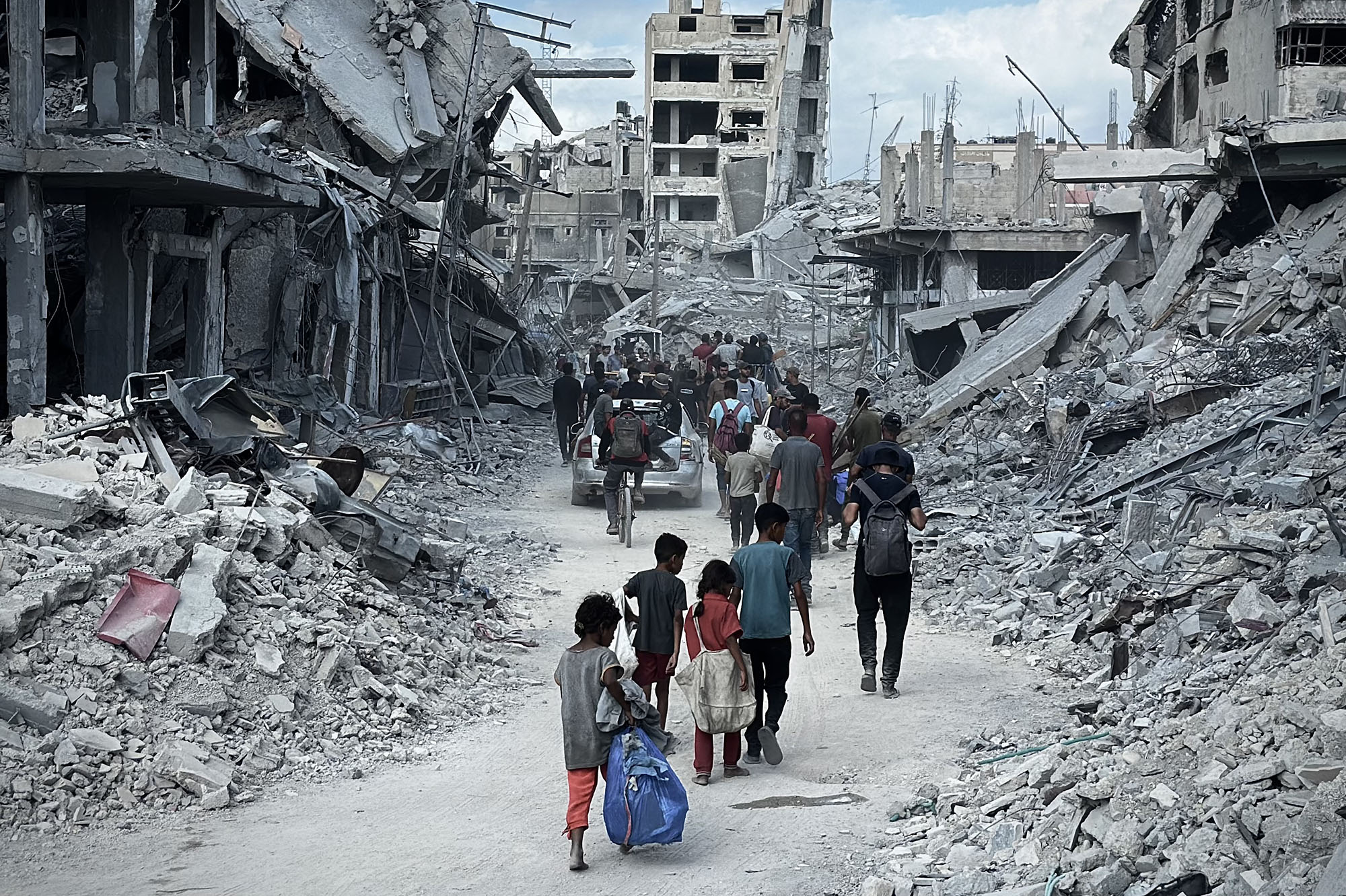 Palestinians began returning to their homes with the ceasefire coming into effect in Gaza