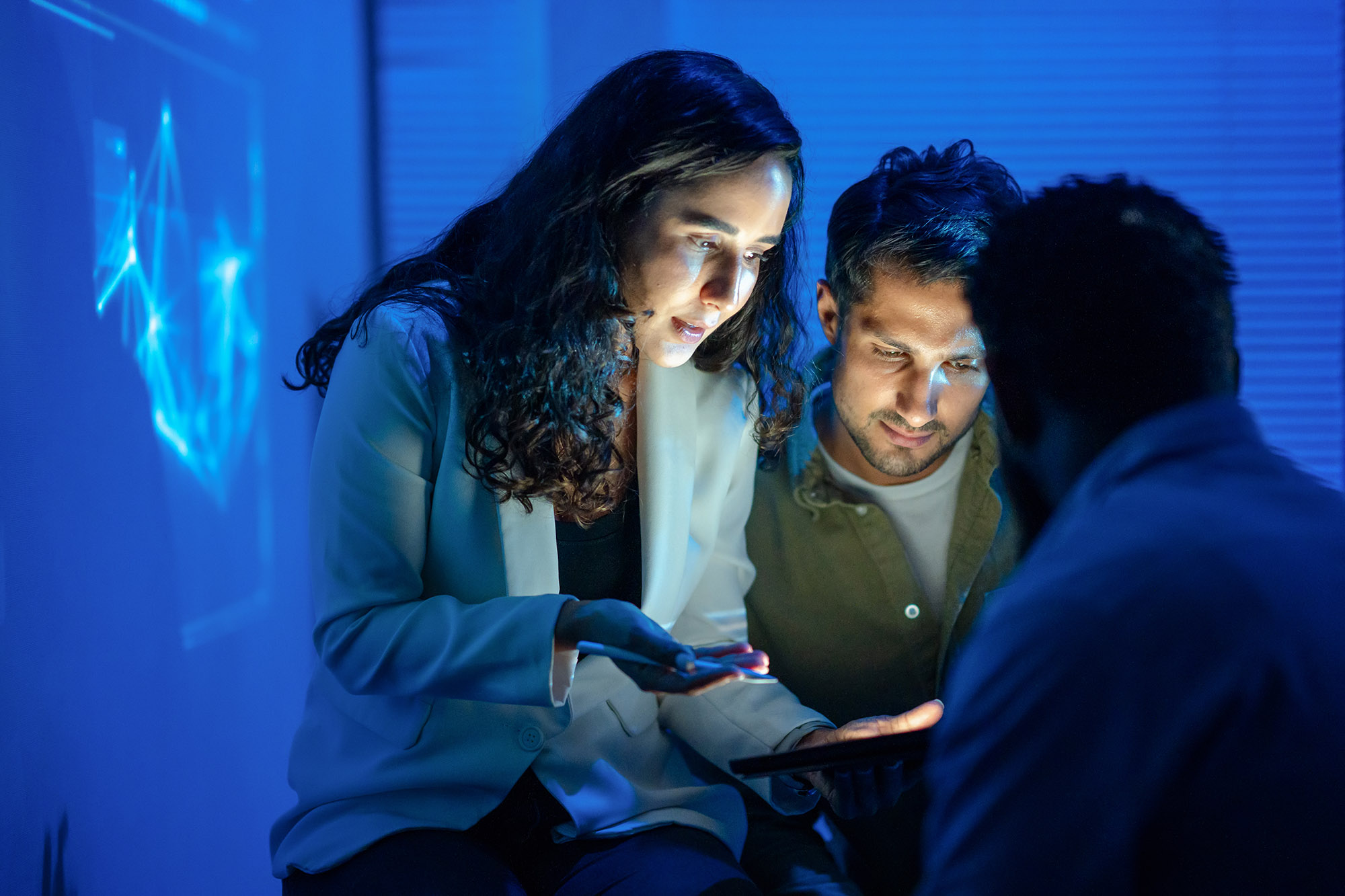 A teamwork, innovation, and late-night coding sessions with expert programmers brainstorming cutting-edge AI solutions. Perfect for modern tech and business visuals.