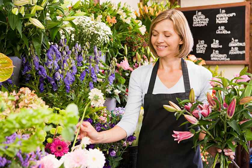 A woman selling flowers