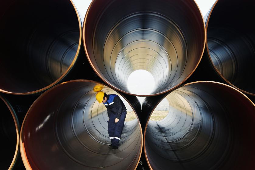 Gas pipes with a worker inside them