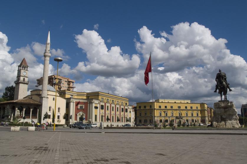 Statue of Skanderbeg (national hero of the Albanians), Ethem Bey mosque and the clock tower in Skanderbeg Square, Tirana.