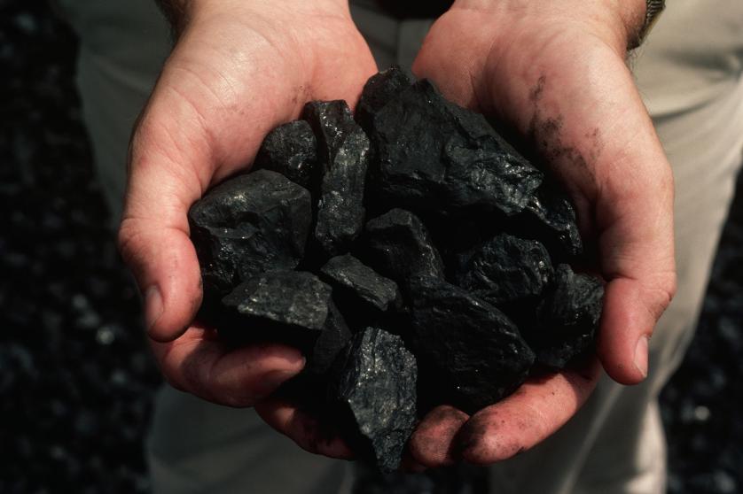 Holding a Handful of Coal