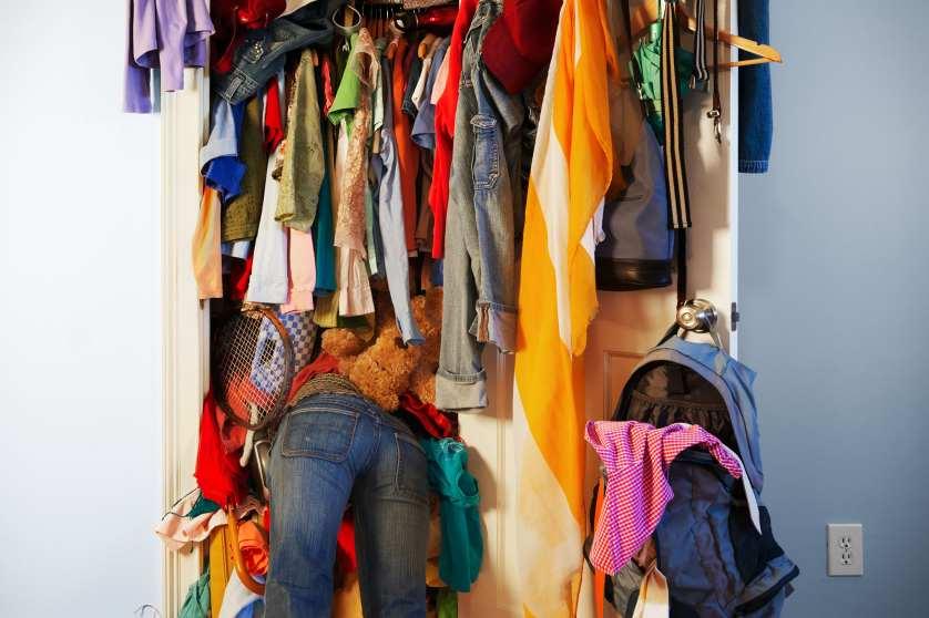 very messy, unorganized closet