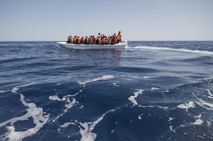 A migrant boat in distress seen in the Maltese SAR zone offshore