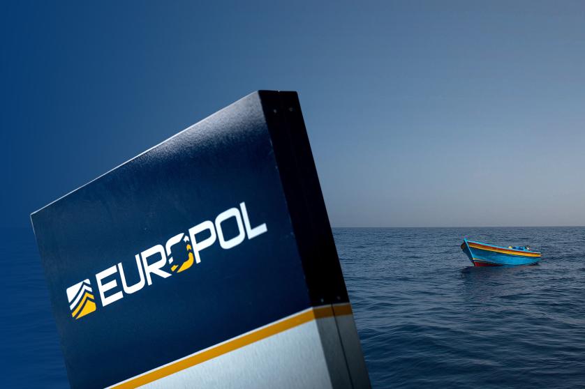 Europol logo and migrants boat
