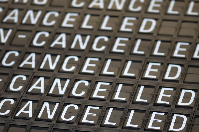 A display indicates cancelled flights at Frankfurt Airport in Frankfurt am Main, western Germany, on July 27, 2022, after employees of German airline Lufthansa were called to strike