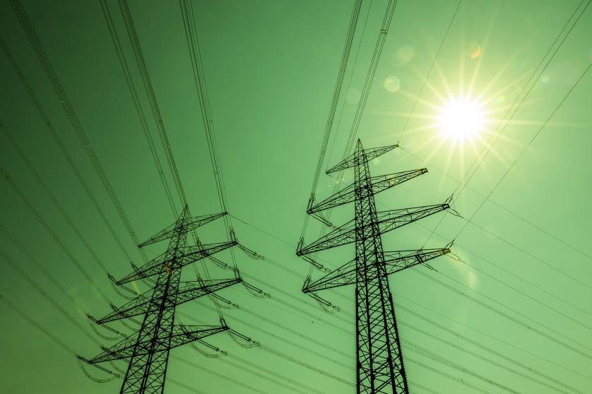 Electricity pylonss with bright sun