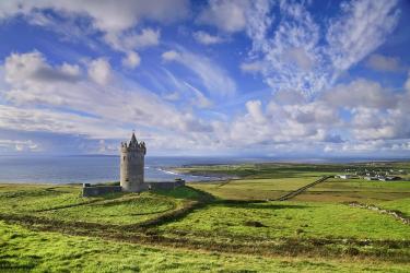 View of Doonagore Castle above Doolin village in County Clare, Ireland