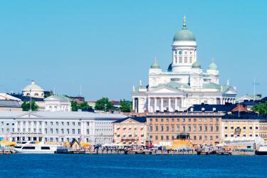The old town of Helsinki seen from the sea on a sunny summer day with the Helsinki Cathedral rising above the rest of the buildings