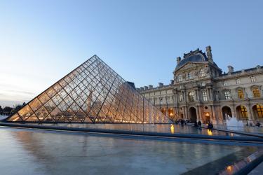 View of the Louvre Pyramid in Paris, France