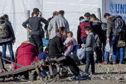 Refugees waiting to register at the Macedonian border with Greece