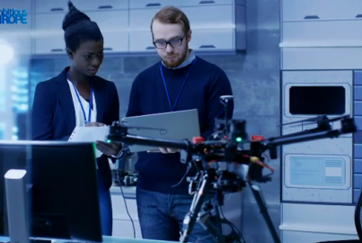 a couple trying to fly a drone