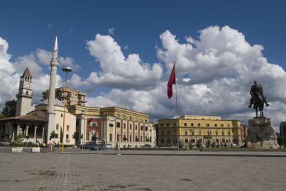 Statue of Skanderbeg (national hero of the Albanians), Ethem Bey mosque and the clock tower in Skanderbeg Square, Tirana.