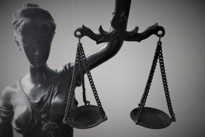 Small figure representing the law