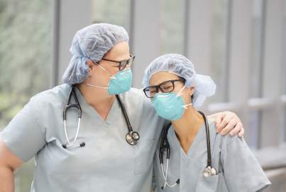 two doctors with masks