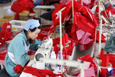 Female labors work in a cloth factory