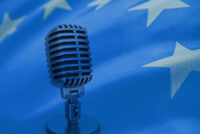 Microphone in front of an European flag