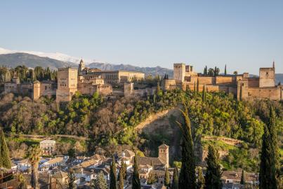 Alhambra on the Sabikah hill, Moorish citadel, Nasrid palaces, Palace of Charles the Fifth, behind Sierra Nevada with snow, Granada, Andalucia, Spain