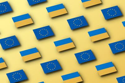 Conceptual image of grid pattern of floating European Union and Ukrainian flags on a yellow background