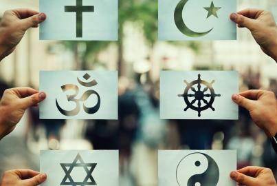 6 papers with the religious symbols of Christianity, Islam, Hinduism, Buddhism, Judaism and Taoism