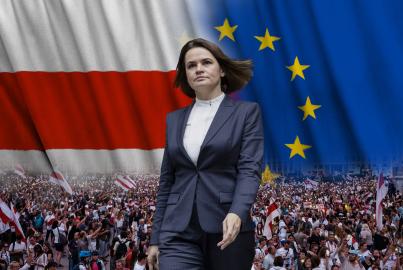 Sviatlana Tsikhanouskaya in front of EU flag and Belarus red and white flag