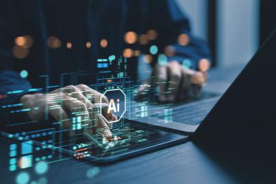 Humans are using laptops and computers to interact with AI