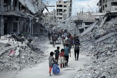 Palestinians began returning to their homes with the ceasefire coming into effect in Gaza