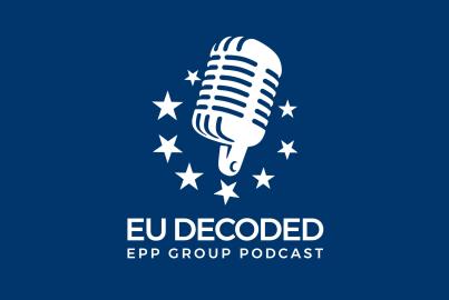 EU Decoded logo - studio microphone surrounded by stars